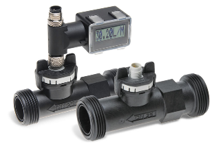 two Vortex flow meters, one with display